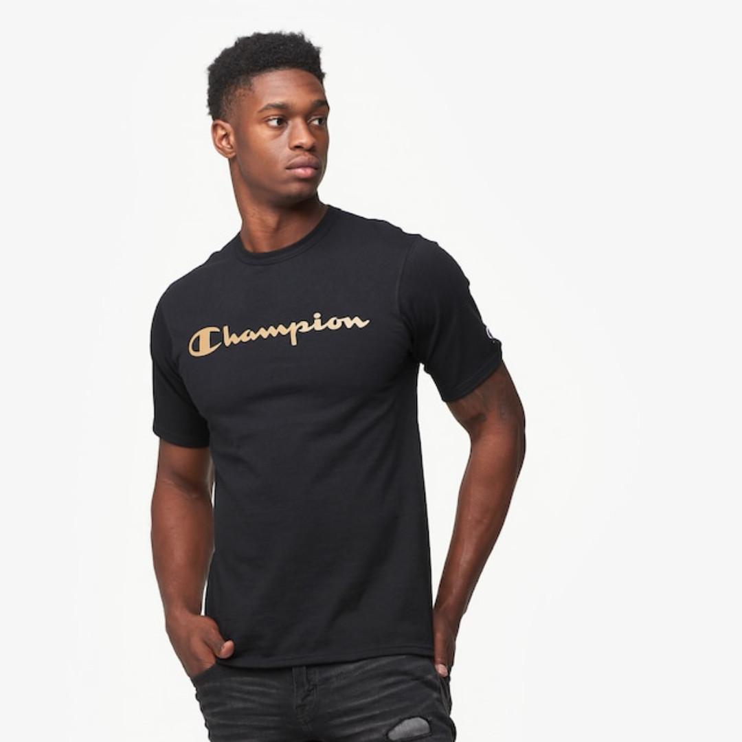 gold and black champion shirt