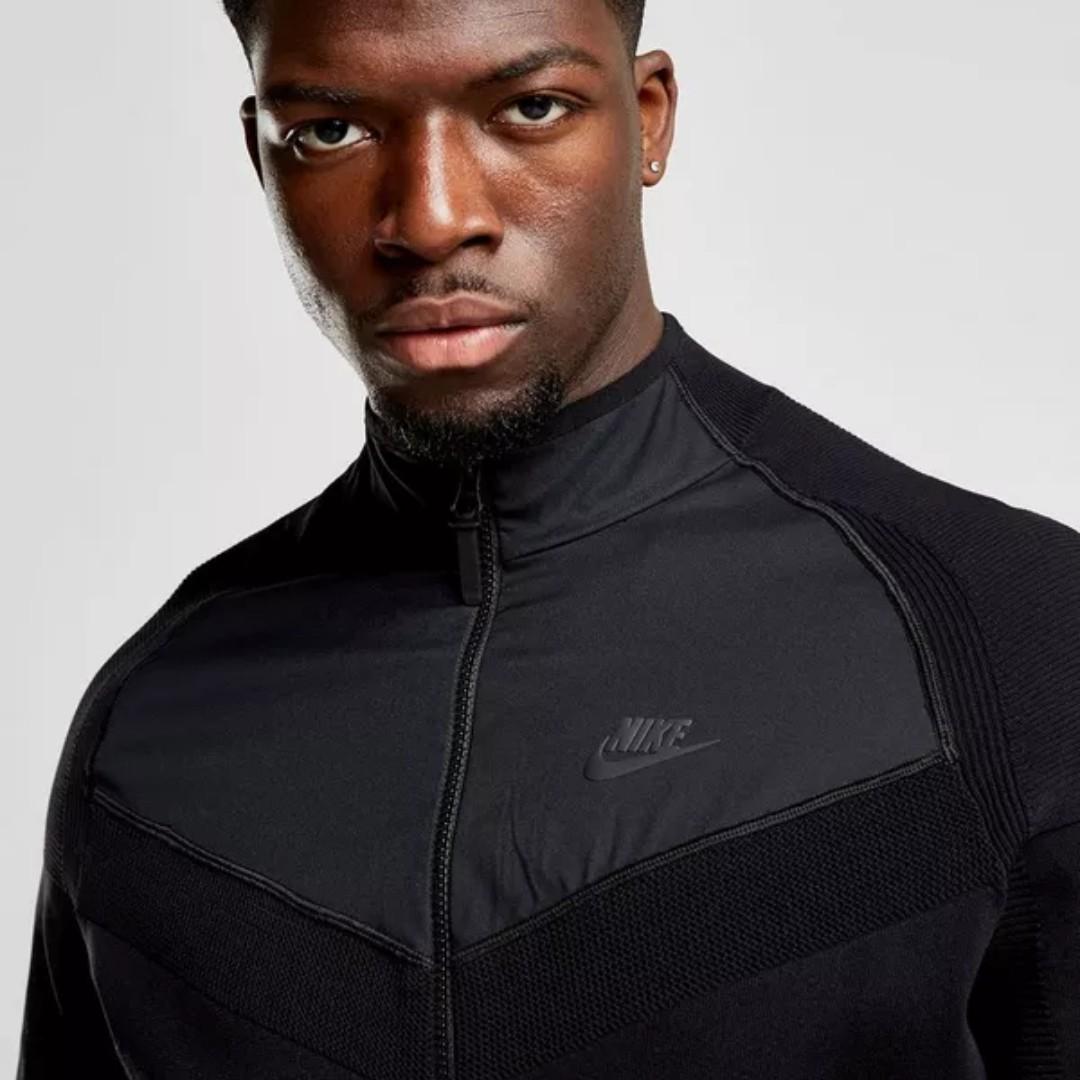 nike tech track top