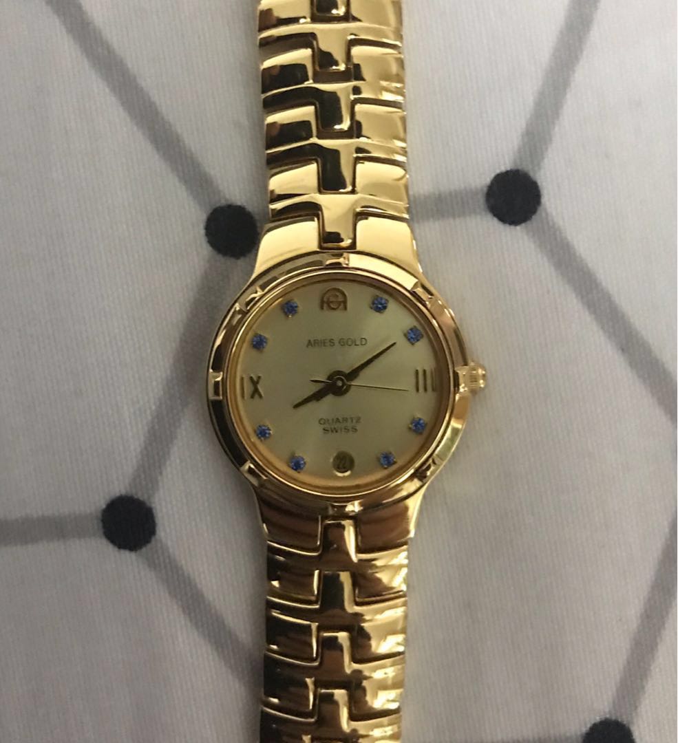 Aries hot sale gold swiss