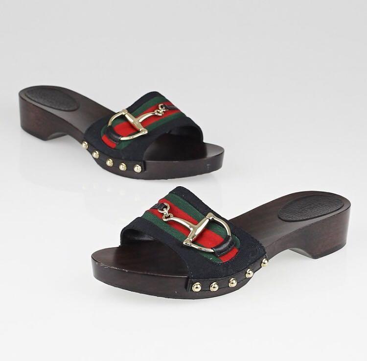 Gucci wooden 2025 slides