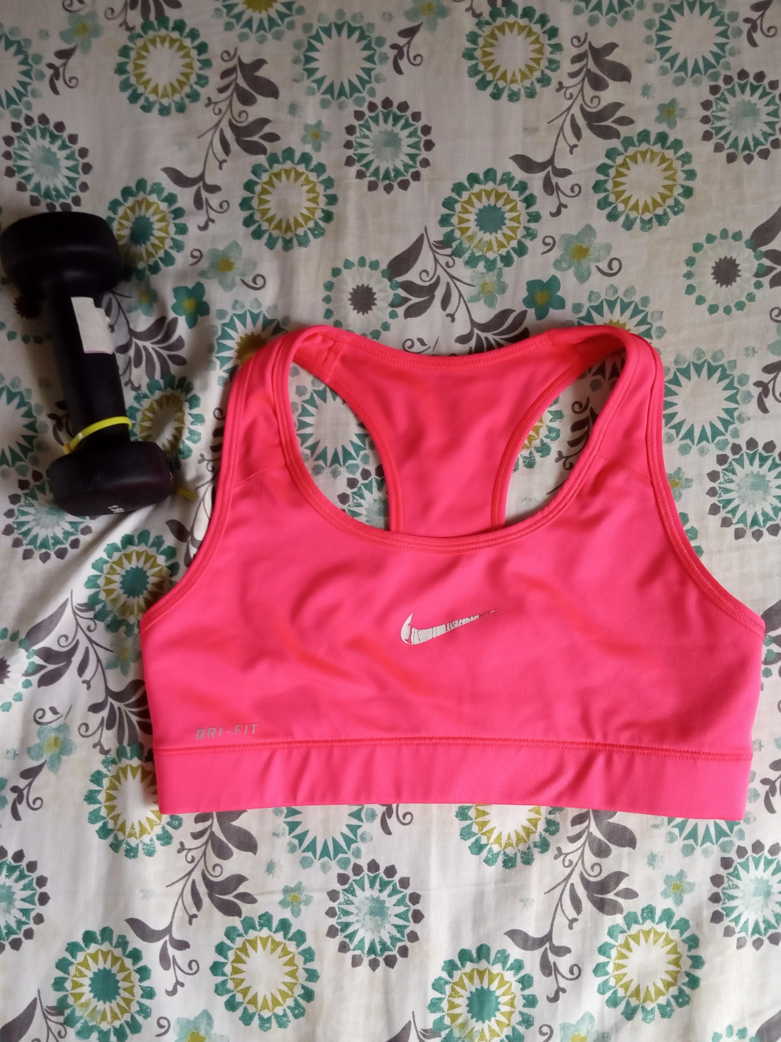 neon pink sports bra nike