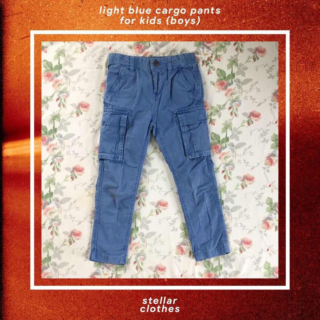Light Blue Cargo Pants for Kids (Boys) (Category: Babies & Kids Fashion) located in Bulacan. Submitted by stellarclothes (Listing ID 230977855, Image 1). Description: • This pair of pants has additional pockets which add an army touch to its design. • Fit for boys aged 4 to 6. • Price: Fixed. • Reason for Selling: Need cash. • Condition: Slightly used. • Flaws: Light iron marks (see 8th and 9th photo). • Measurements: See last photo. • Reservatio