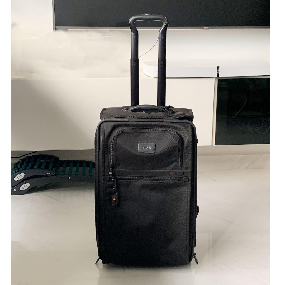 tumi hard shell carry on