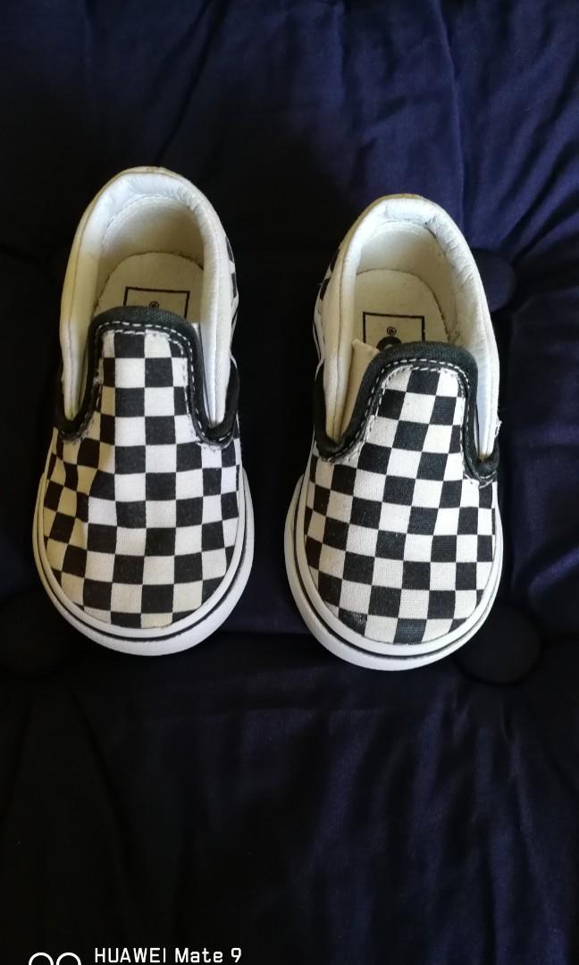 vans checkerboard slip on size 4