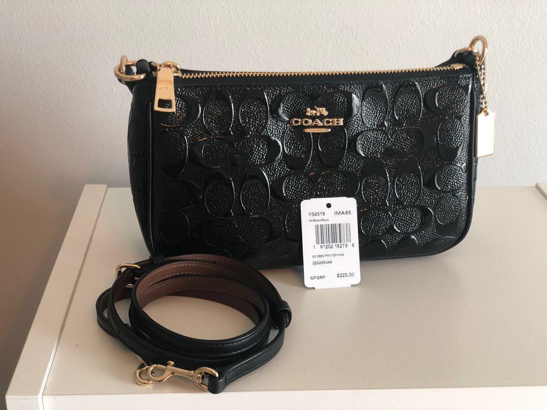coach top handle pouch in signature leather