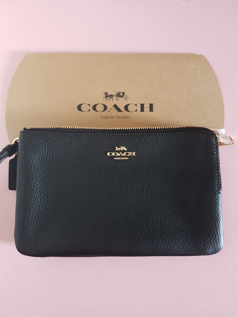 Coach clutch bag black color, Luxury, Bags & Wallets on Carousell