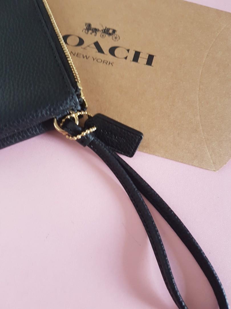 Coach clutch bag black color, Luxury, Bags & Wallets on Carousell