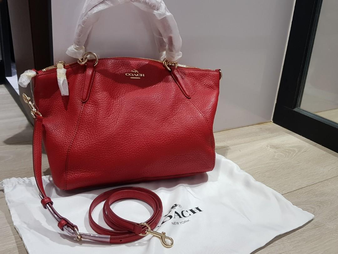 Red leather coach bag top