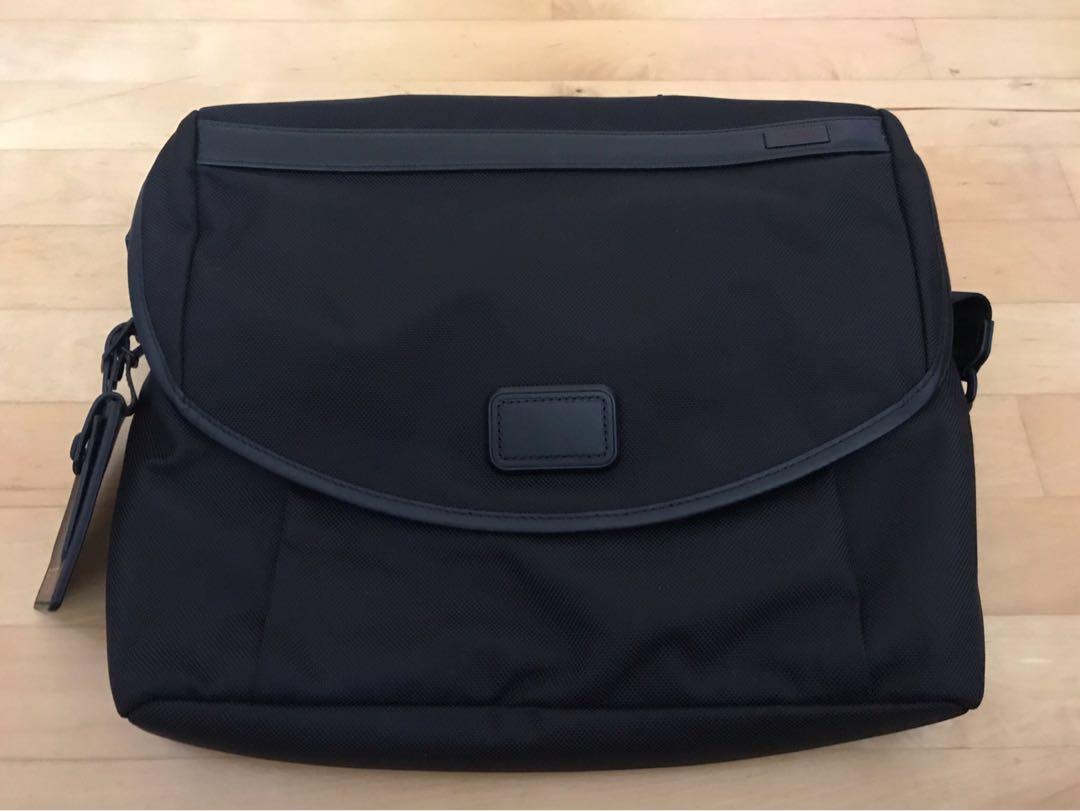 tumi slim messenger bag