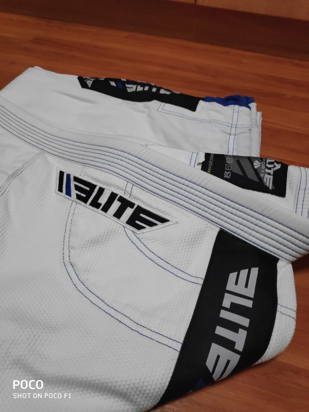 Elite BJJ Gi (White/Blue), Men's Fashion, Activewear on Carousell