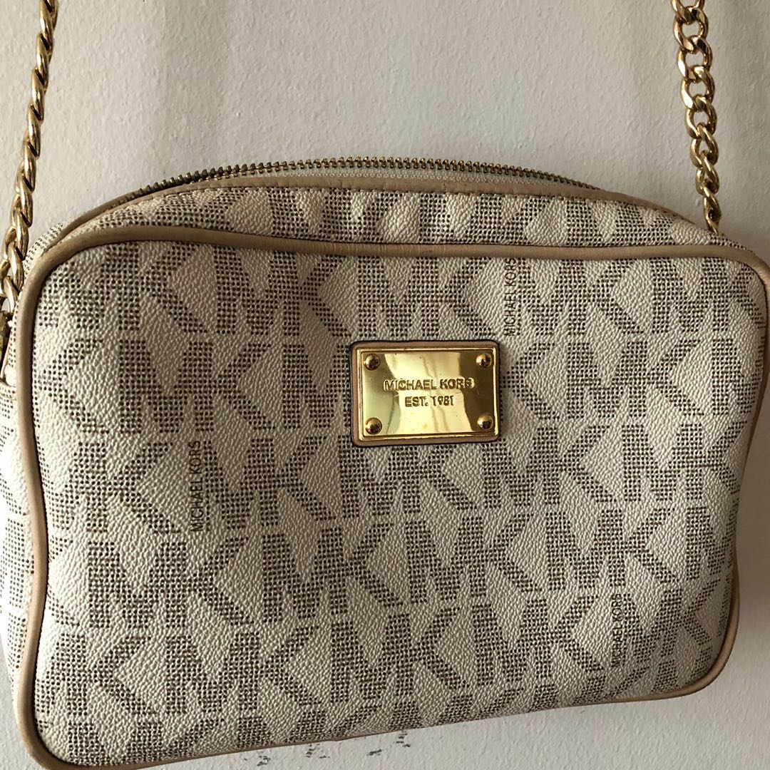 Mk sling bag sale sales