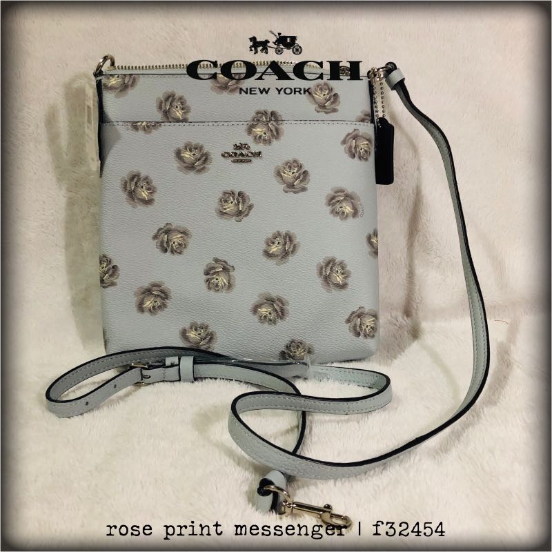Kitt messenger crossbody in signature rose print top