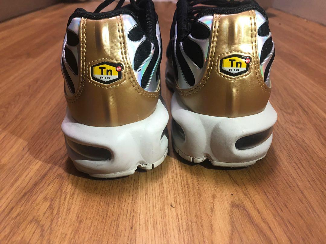 black white and gold tns