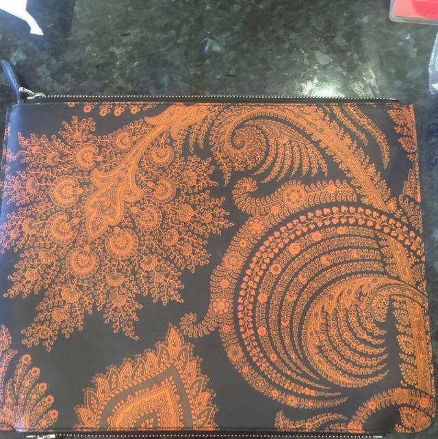 Givenchy Clutch (Category: Luxury Bags & Wallets) located in Makati City. Submitted by stillnicestuff (Listing ID 76964610, Image 1). Description: Repriced! Guaranteed authentic. Zipper on top and bottom. Can put things on both side. Used few times only. With dust bag. Bought for 18k. Meet up bgc or mckinley.