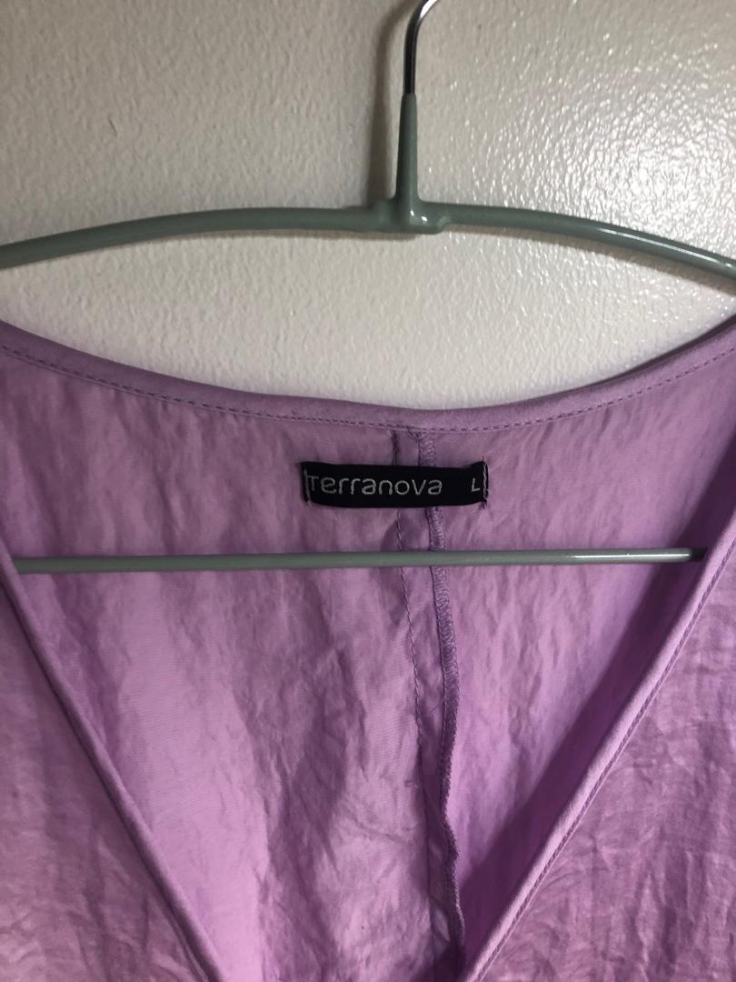 Lilac Romper (Category: Rompers) located in Makati City. Submitted by vborja (Listing ID 231866086, Image 3). Description: Used once as a getting ready suit for a wedding. Not really my color but it’s the perfect romper to use when lounging! Super comfy and cool..