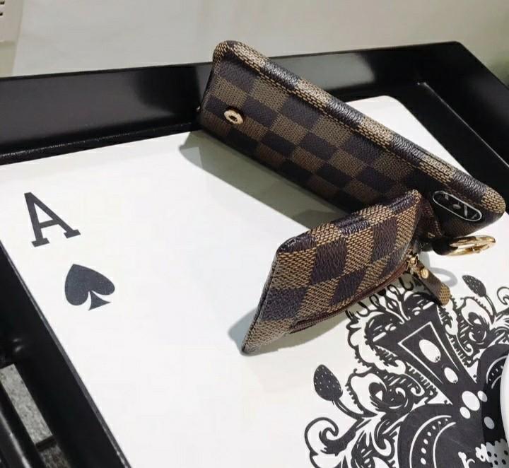 LV leather case for iphone X (Category: Cases & Sleeves) located in San Juan City. Submitted by matchlessgetup.ph (Listing ID 231883923, Image 3). Description: Unique & classy design w/mini pouch,finger and stand support. Brandnew Thick and leather made Available color seen on d last 4pix posted Rfs: purchase a wrong unit #iwantramen #junesweldo.