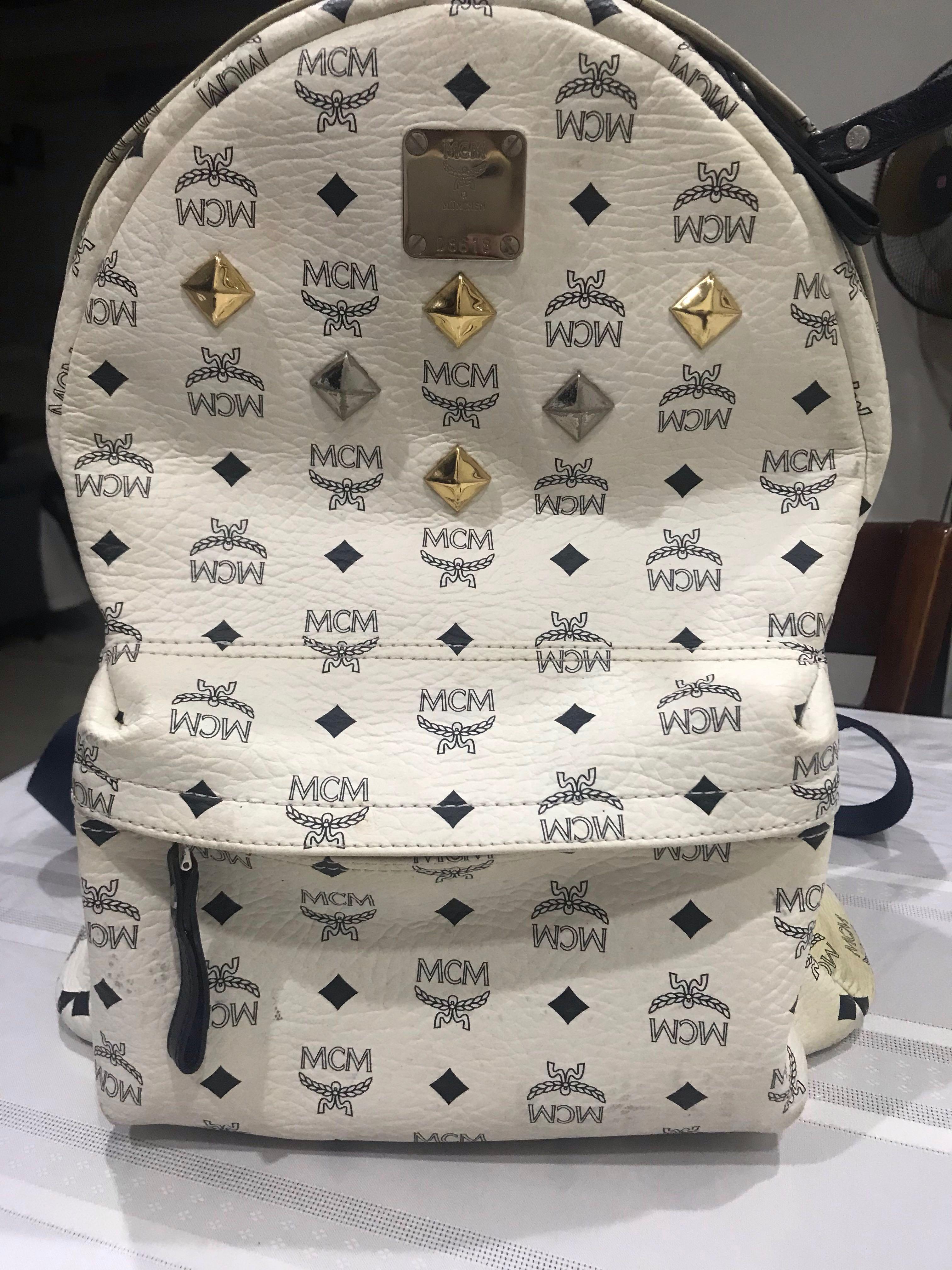 White and hotsell gold mcm backpack