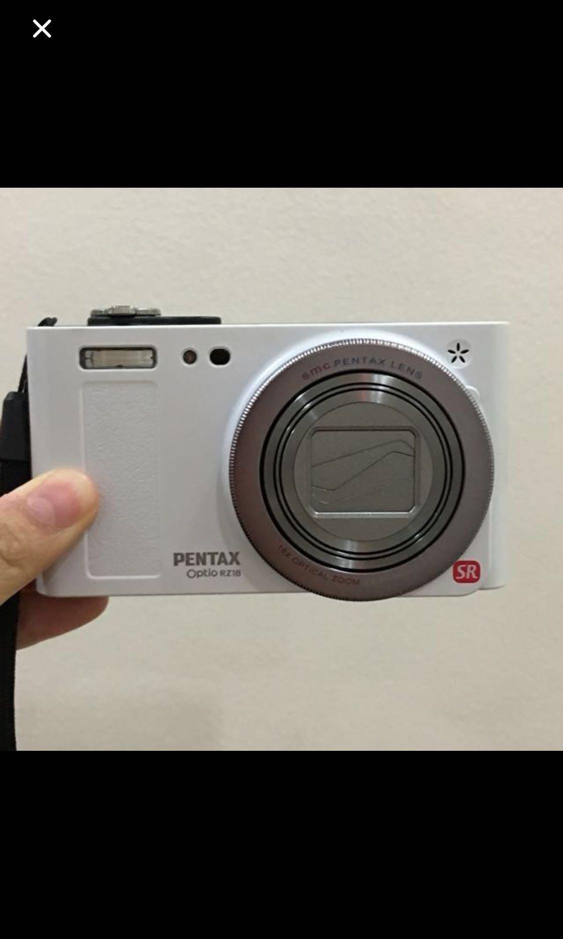 Pentax Optio RZ18 Digital Camera (Category: Video Cameras) located in Quezon City. Submitted by liz.ty (Listing ID 189881596, Image 1). Description: Pentax Optio RZ18 Digital Camera Key Features 18x optical zoom lens (35mm equiv: 25-450mm) 16 megapixel sensor sensor 3 inch LCD screen with 460,000 dots Sensor-shift Shake Reduction Pixel Track SR 720p HD video Face Detection AF Pet mode Wireless remote-control shooting with an optional Pentax remot