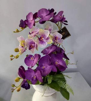 Artificial orchid with ceramic vase