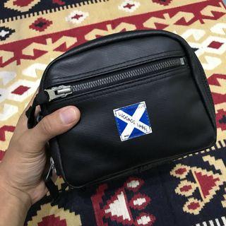 LUGGAGE LABEL SLING BAG