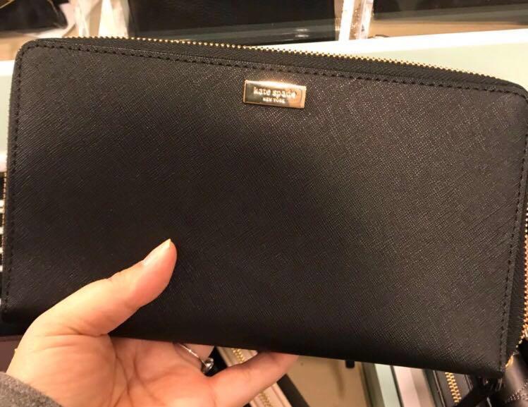 Authentic Kate Spade Travel Wallet (Category: Wallets & Card holders) located in Pasig City. Submitted by simplyvers (Listing ID 201097018, Image 1). Description: Pls feel free to message me should you have questions. Shipping c/o buyer Bought in New York (almost 11k) Thanks.