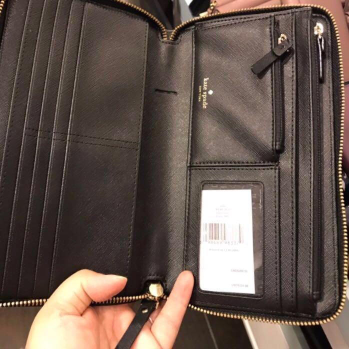 Authentic Kate Spade Travel Wallet (Category: Wallets & Card holders) located in Pasig City. Submitted by simplyvers (Listing ID 201097018, Image 2). Description: Pls feel free to message me should you have questions. Shipping c/o buyer Bought in New York (almost 11k) Thanks.