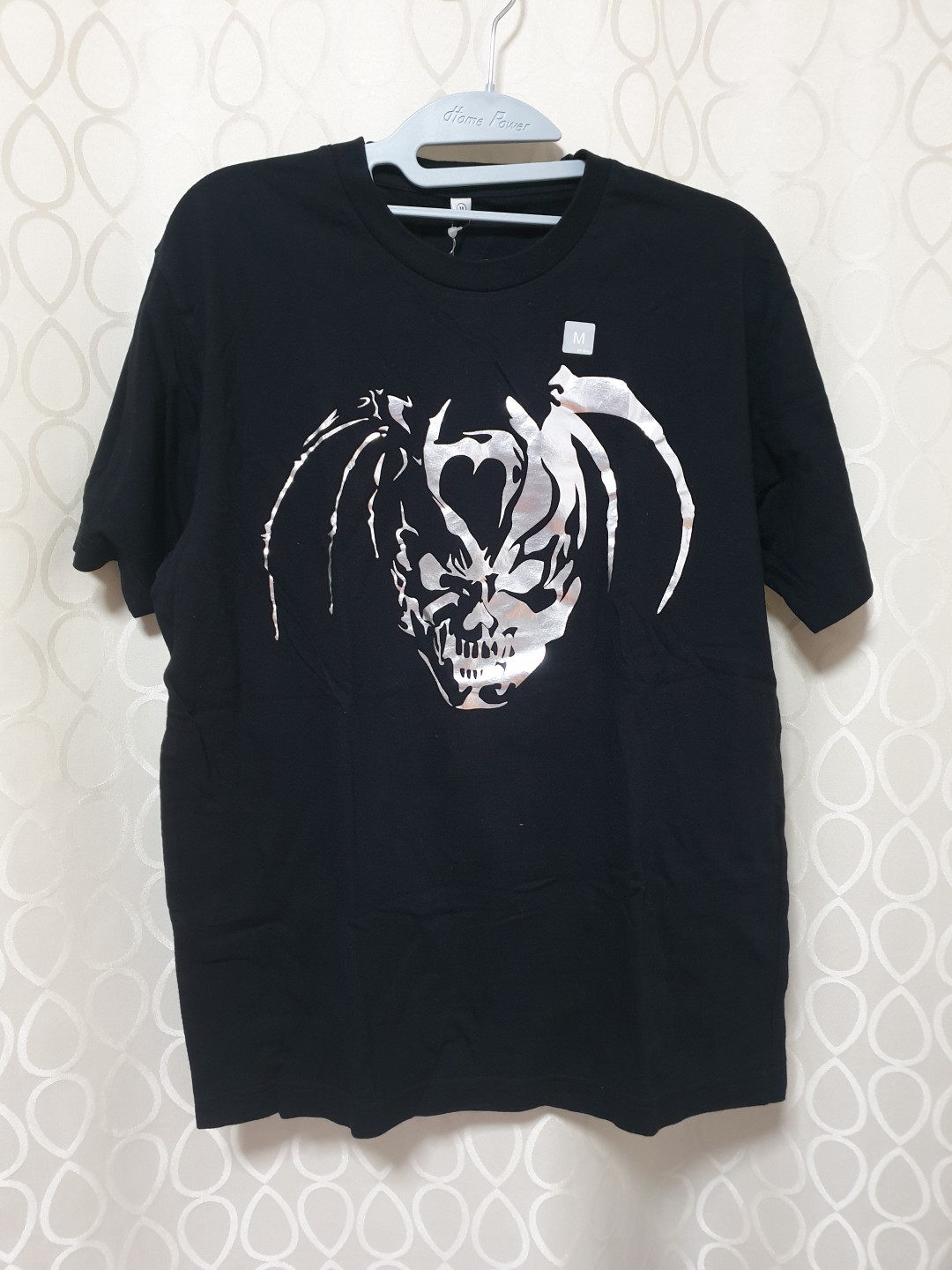 Uniqlo Black Graphic Tee Men S Fashion Clothes Tops On Carousell
