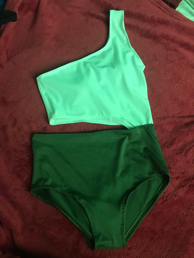 green and white one piece swimsuit