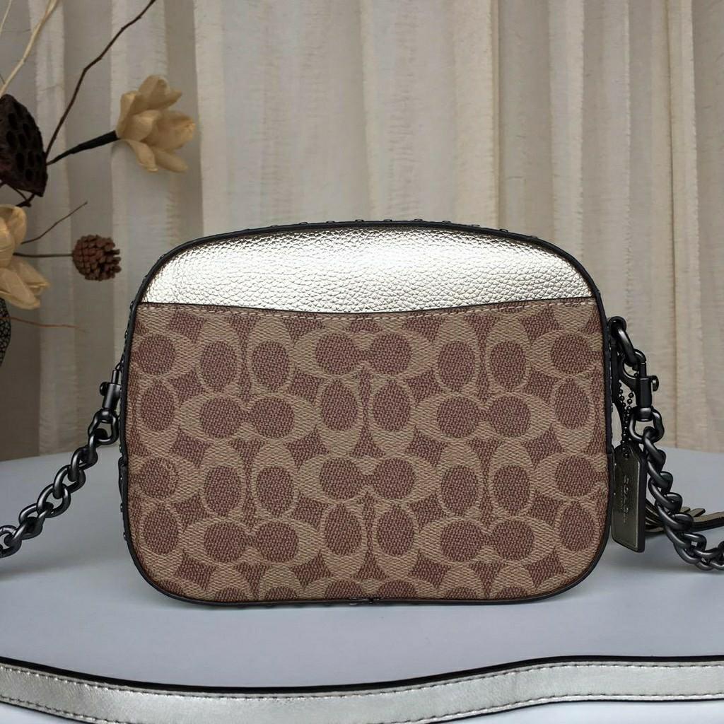 Coach rivets camera bag top