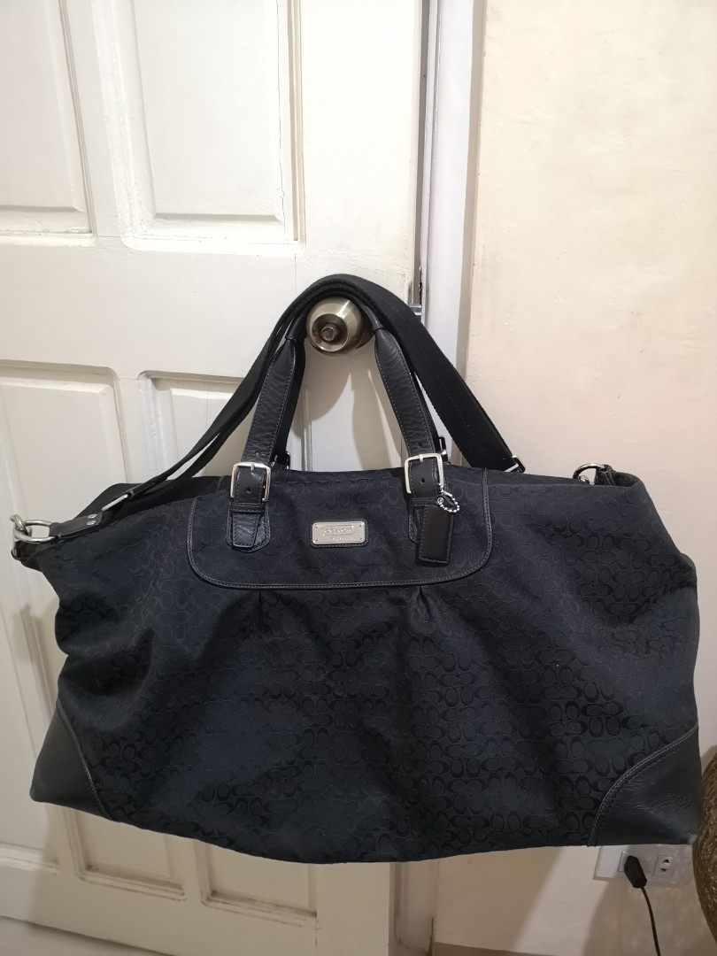 black signature coach purse