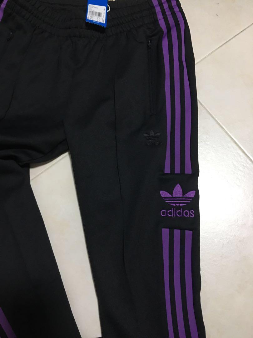 purple stripe adidas pants
