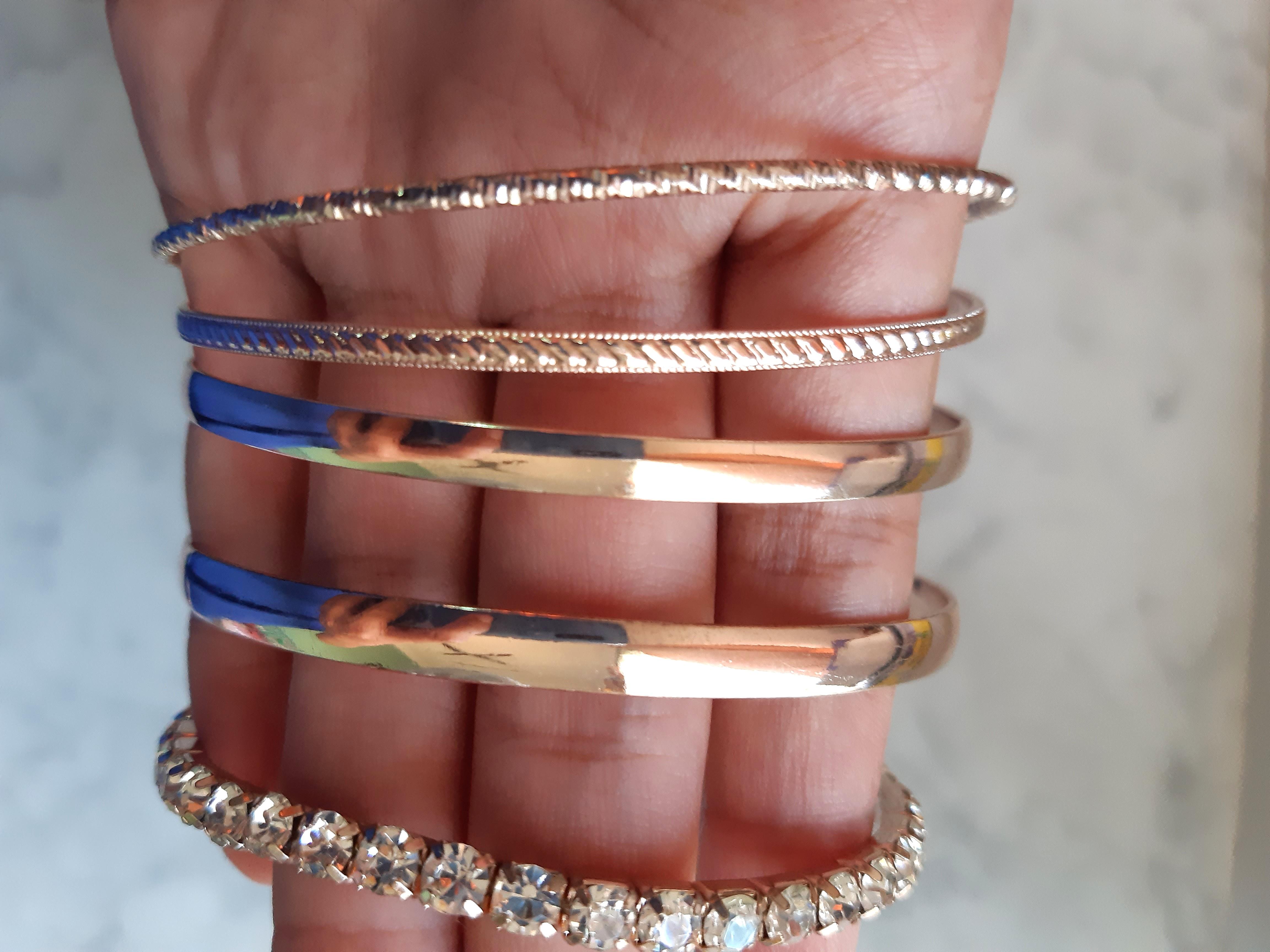 Bangle (Category: Bracelets) located in Kuala Terengganu. Submitted by lessismoretbh (Listing ID 232500178, Image 3). Description: Condition: 9/10 5-piece bangles to glam up your outfit! Not made out of real gold..