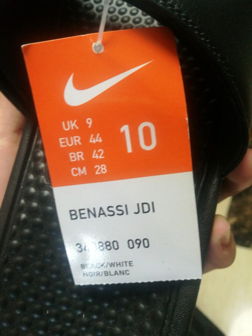 buy nike benassi slides