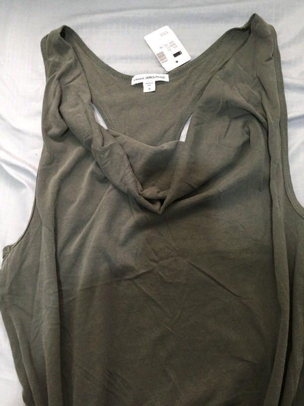 James Perse Racerback cowl neck drawstring mini dress (Category: Dresses) located in Manila. Submitted by sheseesells (Listing ID 231839399, Image 3). Description: FREE SHIPPING (anywhere). Original from Canada US size:3 Color as shown in the pictures (olive green) Bust 36 in True waist 29 half Low hip 40 Across shoulder 15 half Arm length 24 half In seam 34 .