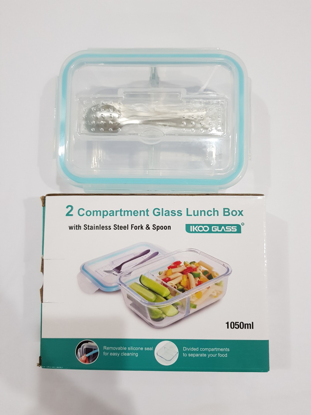 https://media.karousell.com/media/photos/products/2019/06/05/bnib_2_compartment_glass_food_container_1050ml_with_stainless_steel_fork__spoon_1559732000_dca25f5c.jpg