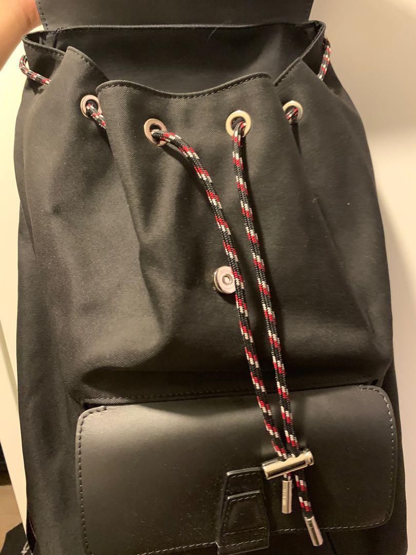 Black calfskin and black hotsell nylon backpack with red detailing