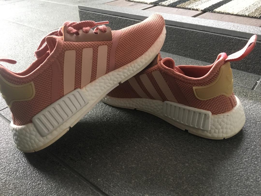 Adidas NMD (Category: Sneakers) located in Singapore. Submitted by alenore_ (Listing ID 232777039, Image 1). Description: Salmon Pink Adidas NMDs Only worn it once. Selling as shoe size is too small for me Size: US 6 (1/2) / UK 5 .