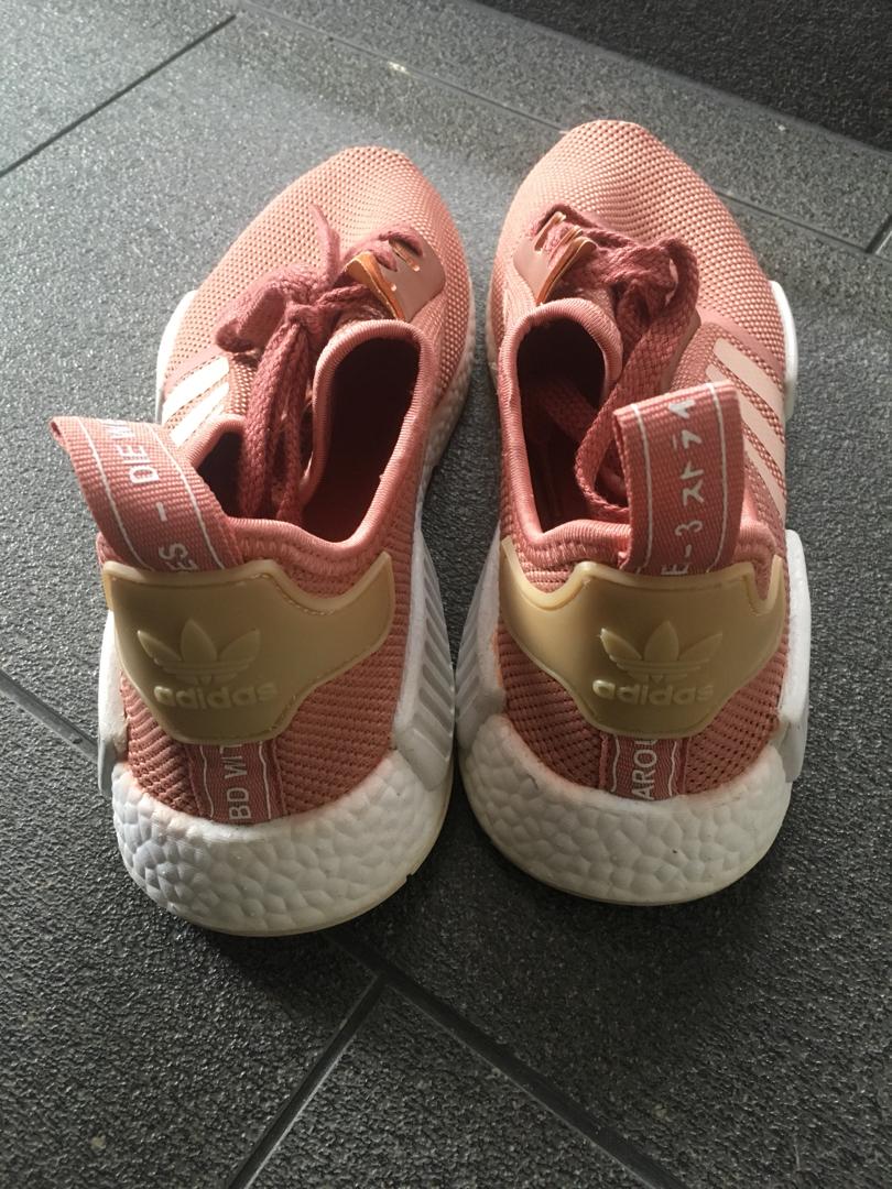 Adidas NMD (Category: Sneakers) located in Singapore. Submitted by alenore_ (Listing ID 232777039, Image 3). Description: Salmon Pink Adidas NMDs Only worn it once. Selling as shoe size is too small for me Size: US 6 (1/2) / UK 5 .
