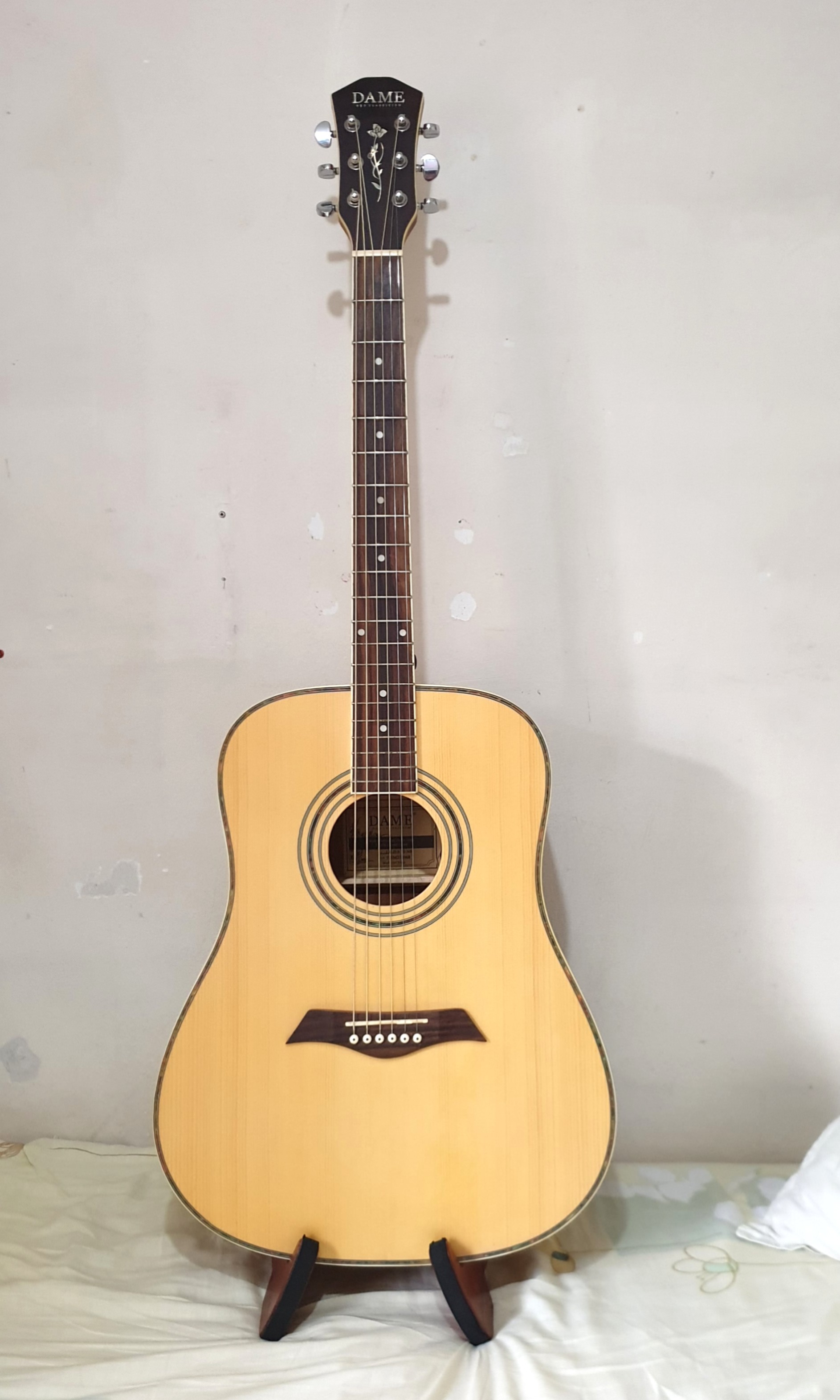 Dame guitar price hotsell