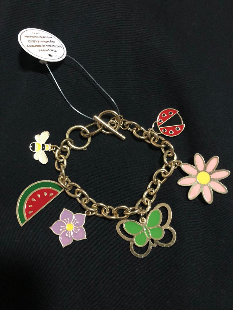 Garden Theme Chunky Charm Bracelet (Category: Bracelets) located in Manila. Submitted by mystuff4less (Listing ID 232721018, Image 1). Description: Brandnew Garden Theme Charms Toggle Lock Charms are big Enameled Charms Bought in US.