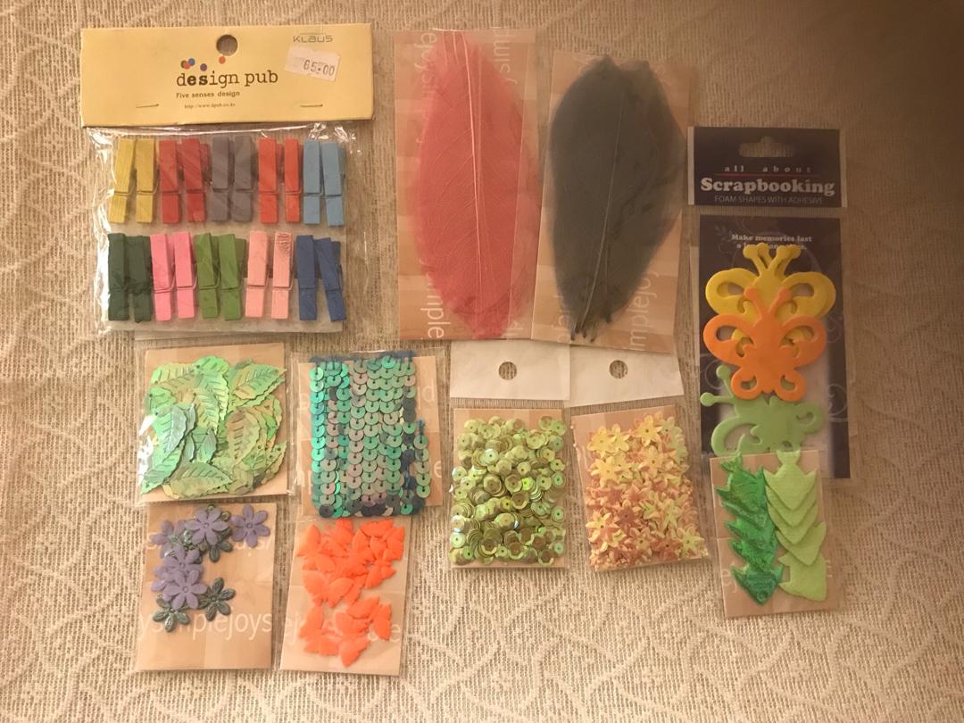 Bundle-Scrapbooking materials (Category: Craft Supplies & Tools) located in Las Pinas. Submitted by mickey0901 (Listing ID 232887047, Image 1). Description: 11 packs of scrapbooking materials including tiny clothespin, leaves, butterflies, flower, fish designs, etc. Most are unopened. I remember using only the fossilized leaves and the foam butterfly. #wincbtl Please read FULLY the Mailing and Delivery section BEFORE making an offer..