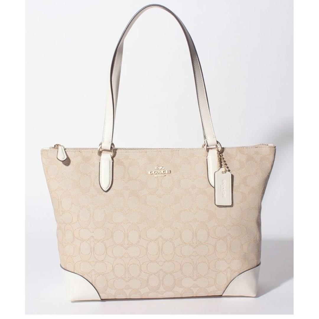zip top tote in signature jacquard
