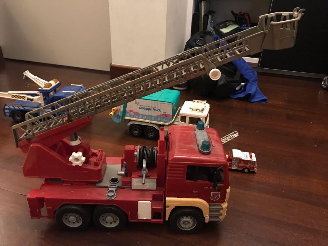 Big Fire Engine Truck Toys Games Others On Carousell Small toy fire engine and a crane cars. carousell