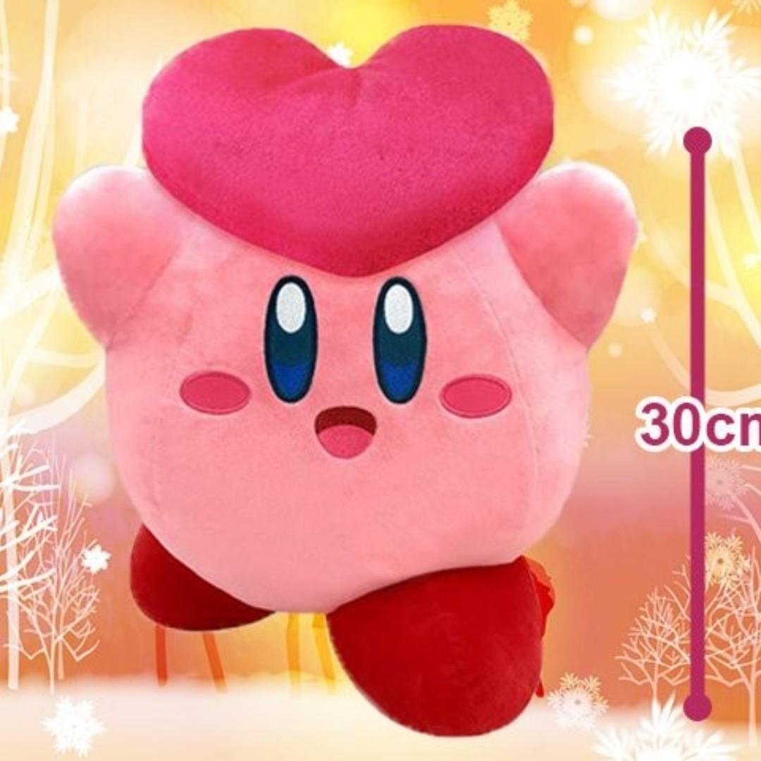 kirby holding heart plush