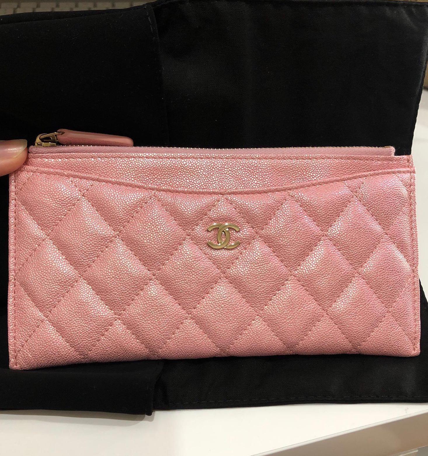 small pink chanel wallet on