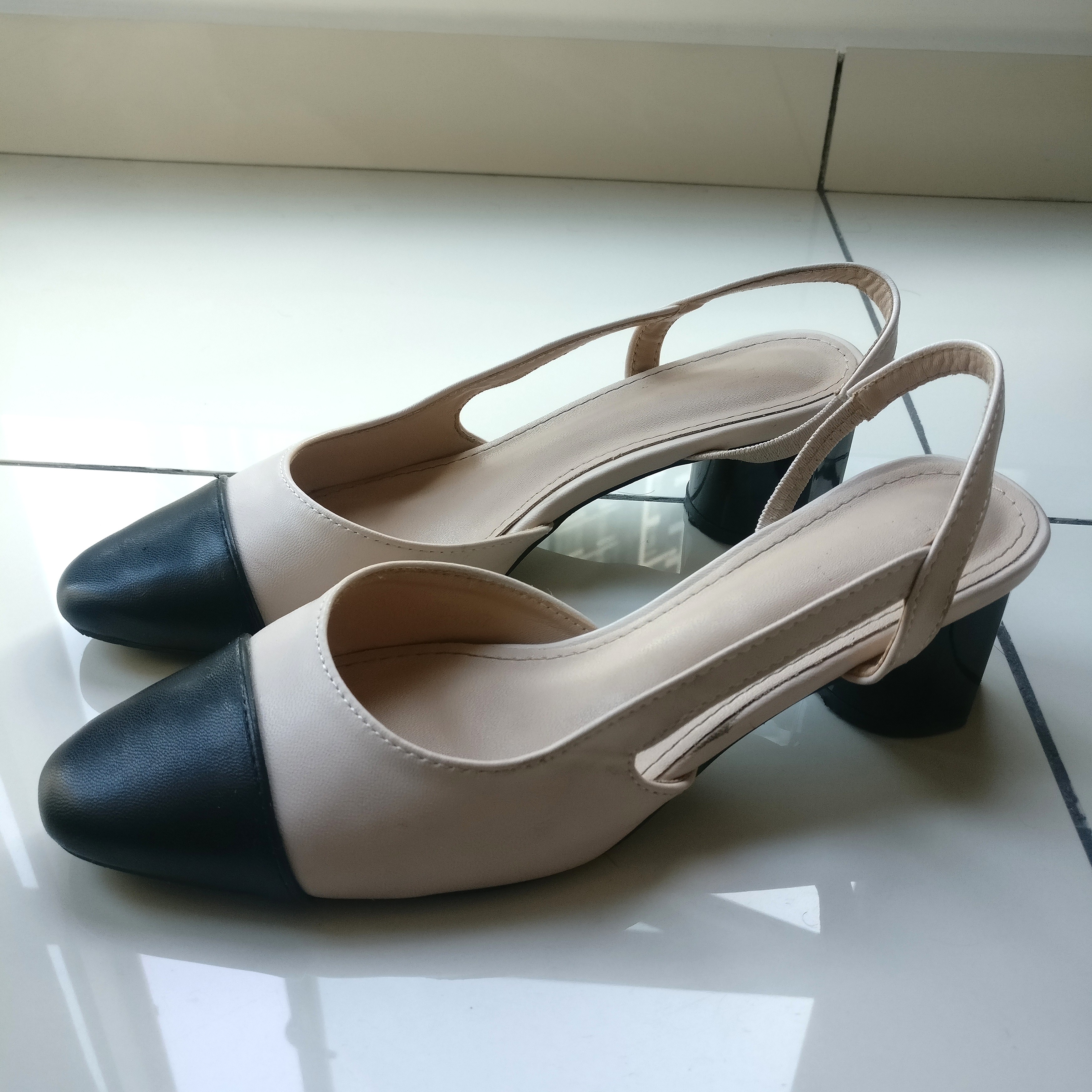 Beige black heels top