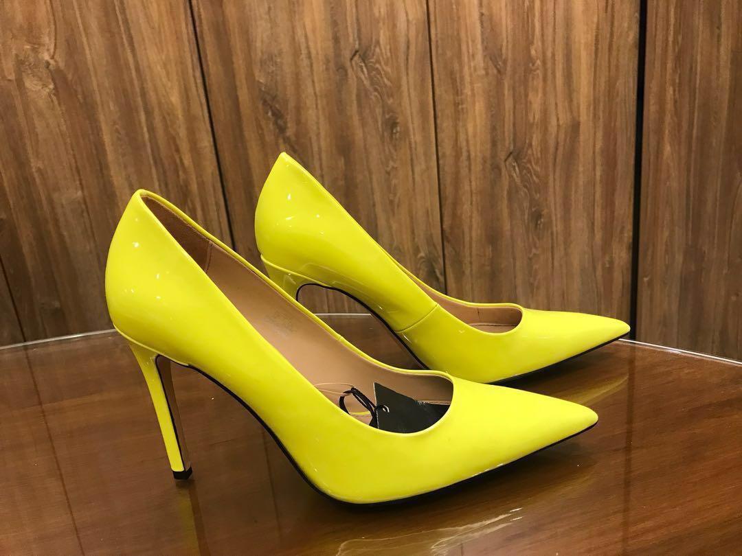 neon yellow and black heels