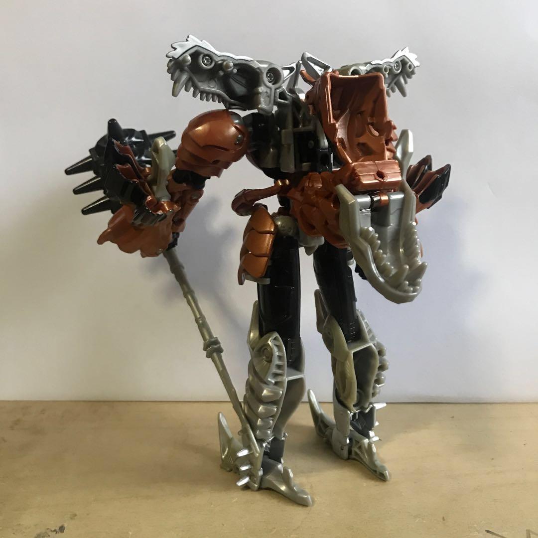 Transformers grimlock (Category: Toy Figures) located in Singapore. Submitted by orcinc (Listing ID 233314550, Image 2). Description: Voyager class Figure is complete No instruction manual Slightly yellowing Buy with the rest of my dinobots in my listing for discount! Pm me for location .
