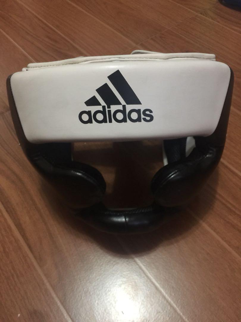 Adidas Boxing Head Gear (Category: Other Sports Equipment and Supplies) located in Pasay City. Submitted by randomruns (Listing ID 233529923, Image 2). Description: Only used once in sparring. Thoroughly cleaned, and hasn’t been used ever since. Original Price was around $50.00 if I recall correctly. RFS: Of no use to me anymore. .