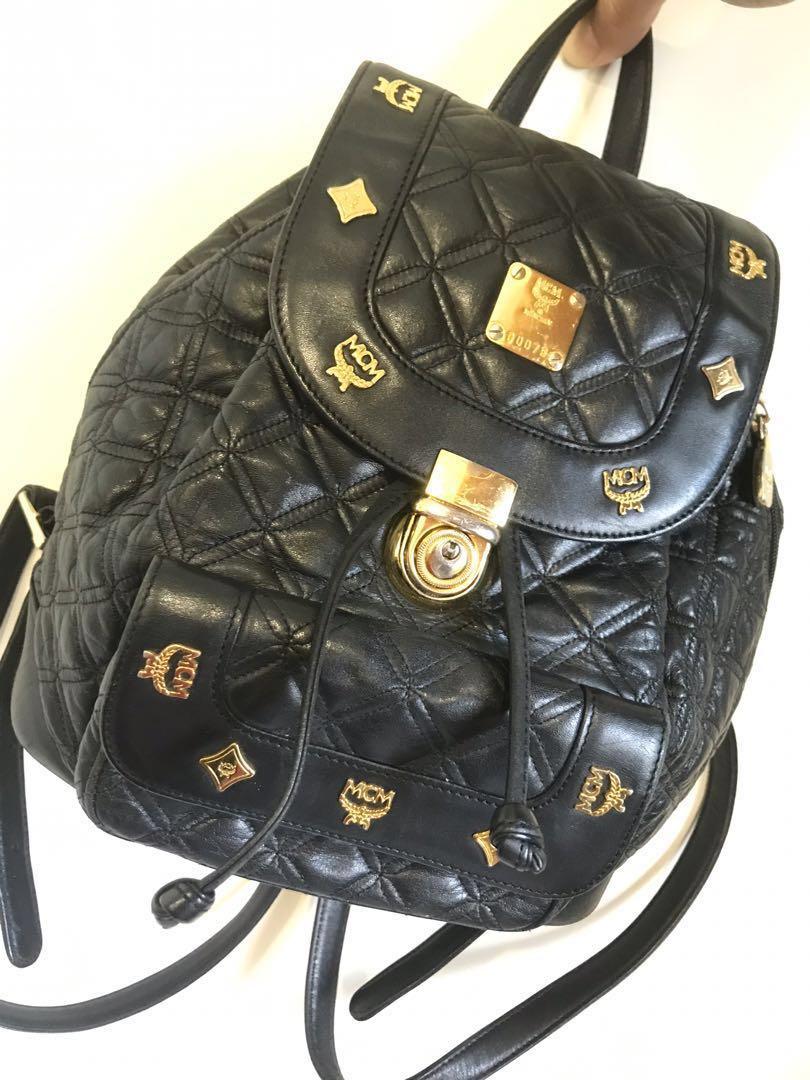 Mcm black leather best sale backpack